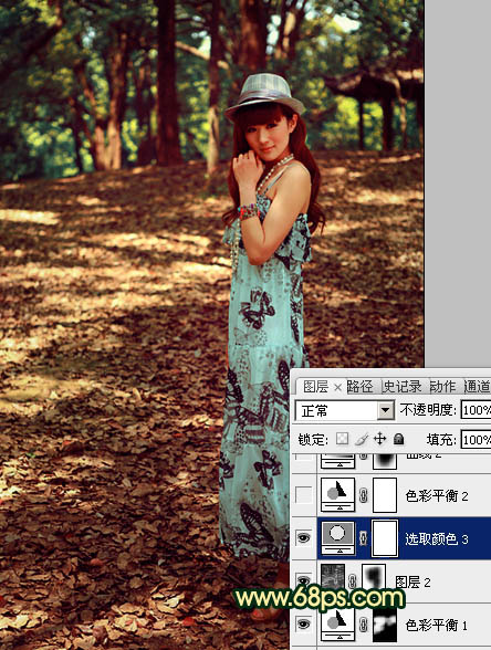 Photoshop将树林女孩图片调成柔和的暗调红青色