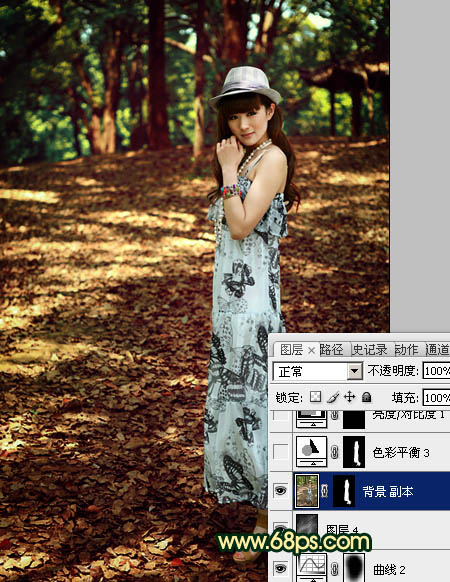 Photoshop将树林女孩图片调成柔和的暗调红青色