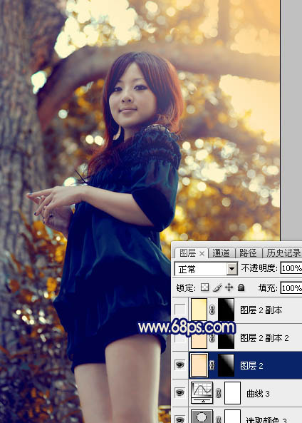 Photoshop将大树边的人物调制出斑斓的霞光暖色