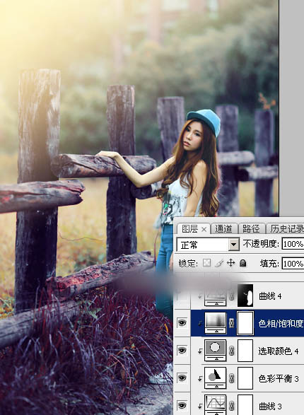 Photoshop为木桩边的美女人物加上高对比蓝黄色效果教程