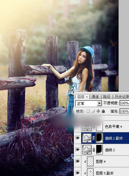 Photoshop为木桩边的美女人物加上高对比蓝黄色效果教程