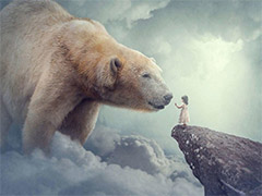 PS创意合成站在山顶召唤大熊的小女孩