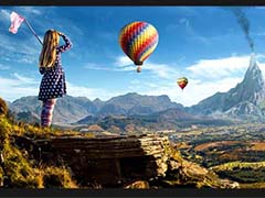 PS合成女孩站在山顶眺望热气球和火山风景的海报教程