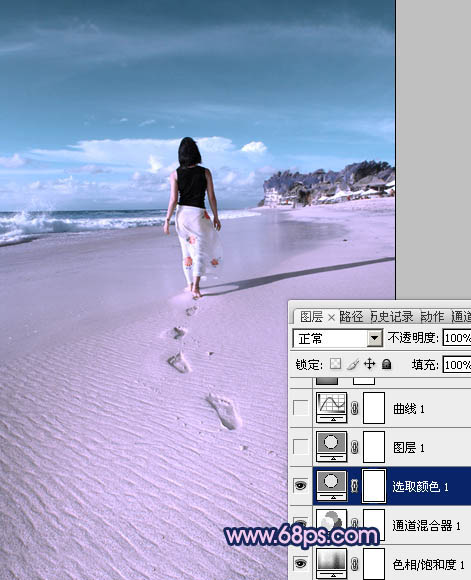 Photoshop将沙滩人物图片调成漂亮的淡蓝色