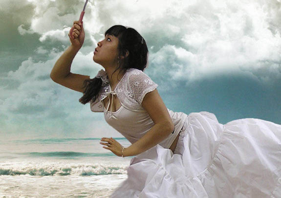 photoshop经典合成海边带伞飞翔的仙女