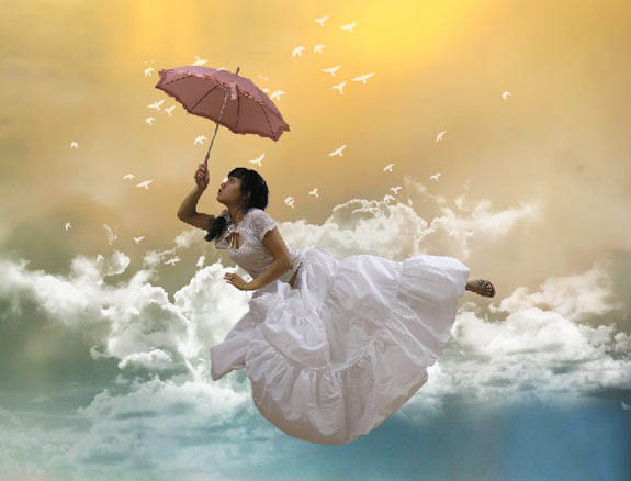 photoshop经典合成海边带伞飞翔的仙女