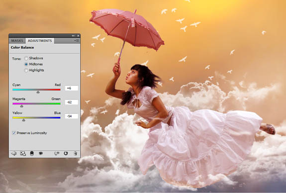 photoshop经典合成海边带伞飞翔的仙女