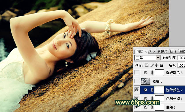 Photoshop将石壁上的女生图片调制成漂亮的黄青色效果