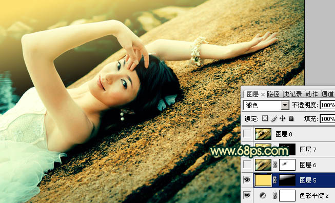 Photoshop将石壁上的女生图片调制成漂亮的黄青色效果