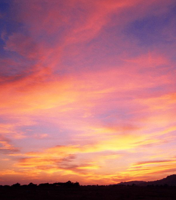 Photoshop将蓝色海景婚片调制成漂亮的晚霞阳光效果