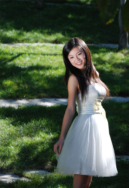 Photoshop将晨曦中灿烂的女生图片打造出橙蓝色效果