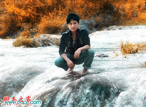 photoshop将溪流中的帅哥图片调制出金秋色
