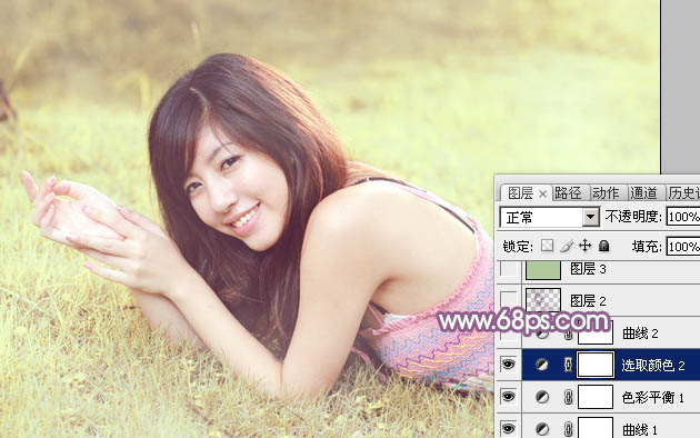 Photoshop为趴在绿草上的美女图片增加朦胧唯美的黄紫色