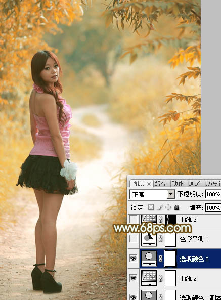 Photoshop将树丛小道上的人物图片增加上柔和的怀旧橙褐色