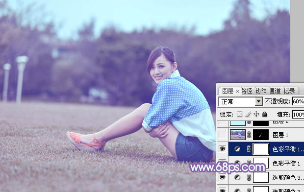 Photoshop为偏暗的草地美女图片加上柔美的浅蓝色调