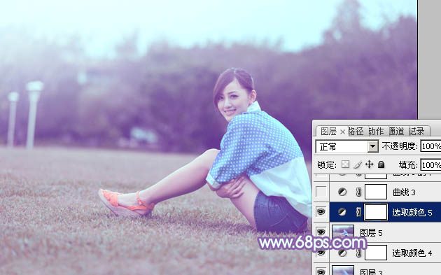 Photoshop为偏暗的草地美女图片加上柔美的浅蓝色调