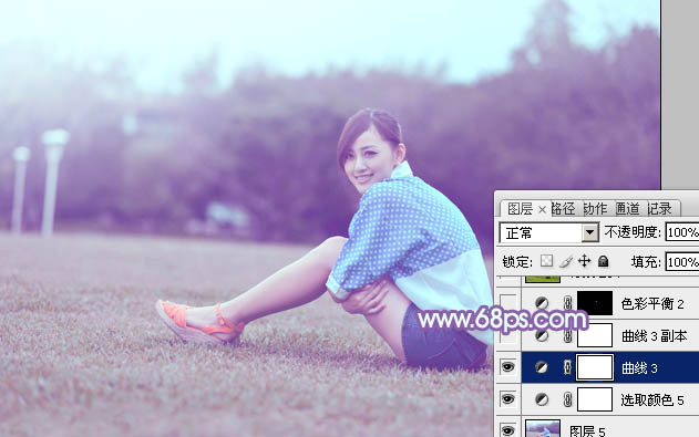 Photoshop为偏暗的草地美女图片加上柔美的浅蓝色调