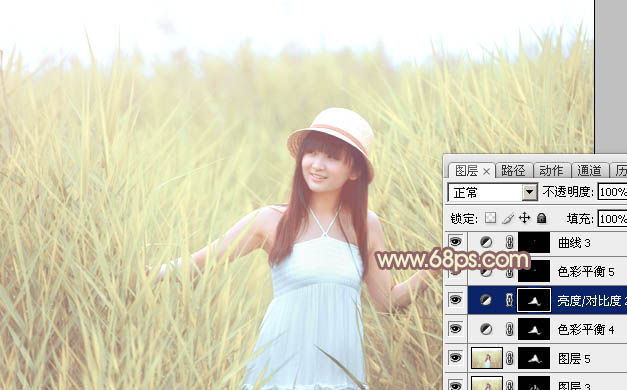 Photoshop将芦苇中的美女加上唯美的韩系淡黄色效果