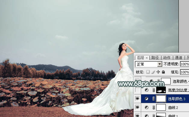 Photoshop为荷塘边的美女加上古典青色调