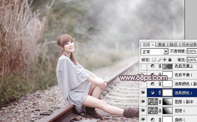 Photoshop调制出唯美的中性淡粉蓝色铁轨美女图片