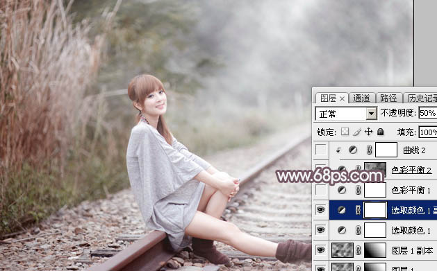 Photoshop调制出唯美的中性淡粉蓝色铁轨美女图片