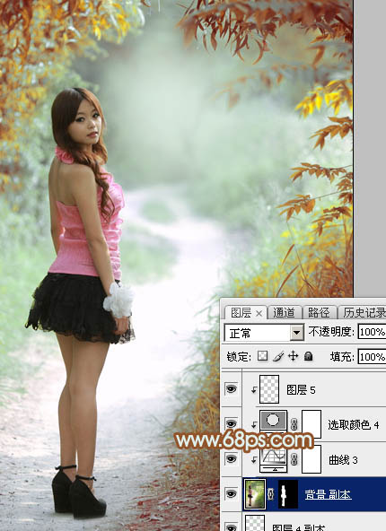 Photoshop给绿树中的人物加上唯美的秋季橙绿色