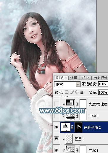 Photoshop为树林美女图片调制出唯美的淡蓝色云彩效果
