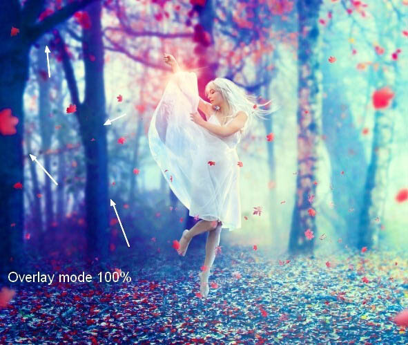 PS合成在唯美的秋色树林中舞动的白衣美女