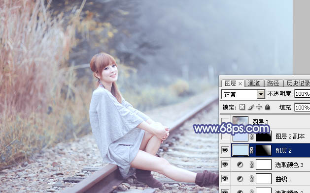 Photoshop将冬季外景人物图片打造出小清新的淡冷色