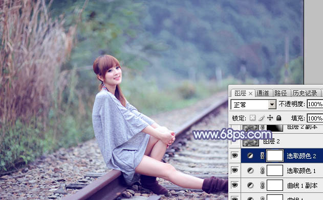 Photoshop快速打造出甜美的春季淡蓝色外景美女图片