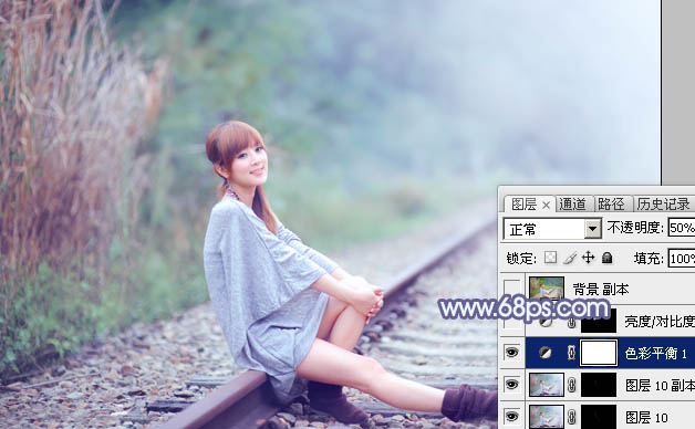 Photoshop快速打造出甜美的春季淡蓝色外景美女图片