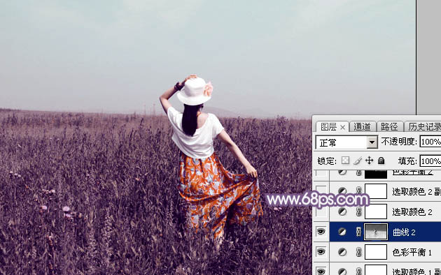 Photoshop为旷野中的人物调制出流行的暗蓝色