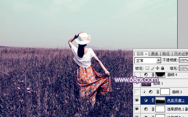 Photoshop为旷野中的人物调制出流行的暗蓝色