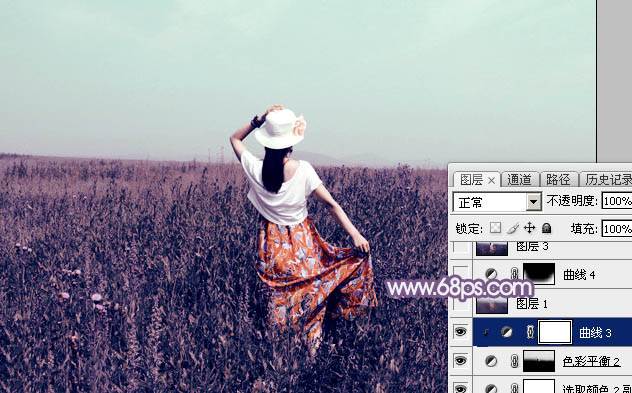 Photoshop为旷野中的人物调制出流行的暗蓝色