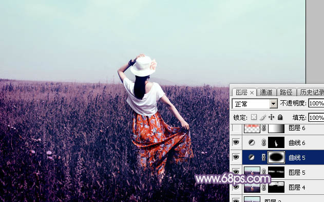 Photoshop为旷野中的人物调制出流行的暗蓝色