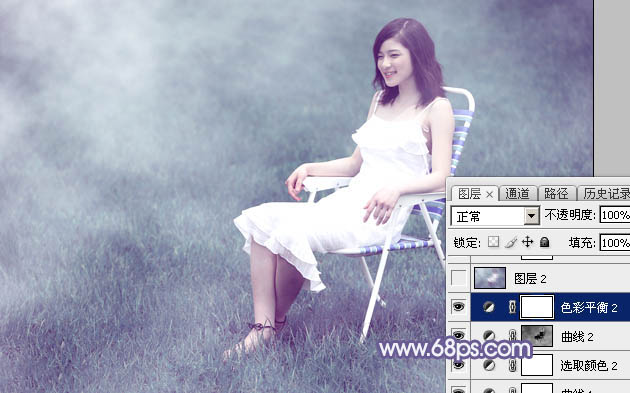 Photoshop调出唯美的淡蓝色草地美女图片