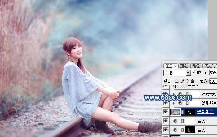 Photoshop调制出梦幻的粉蓝色铁轨美女图片