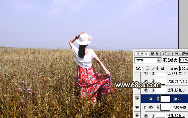 Photoshop调制出秋季冷褐色草原人物图片