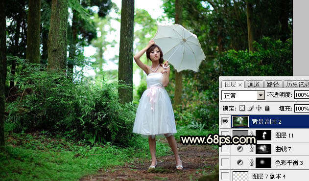 Photoshop调制出较暗的晨曦阳光色树林人物图片