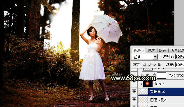 Photoshop调制出较暗的晨曦阳光色树林人物图片