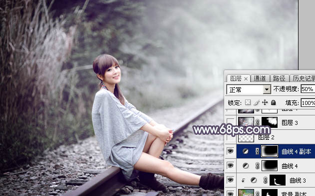 Photoshop为铁轨人物图片打造唯美的中性淡冷色效果教程