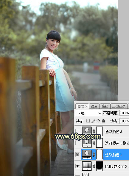 Photoshop调制出秋季晨曦木桥上的人物图片