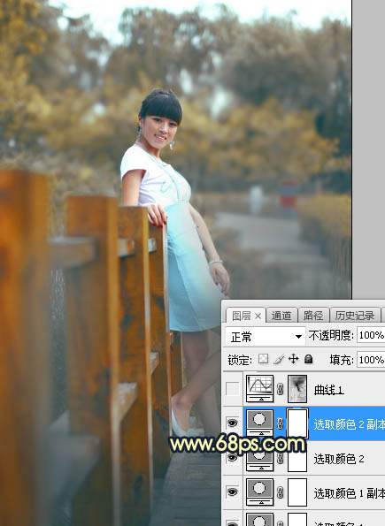 Photoshop调制出秋季晨曦木桥上的人物图片