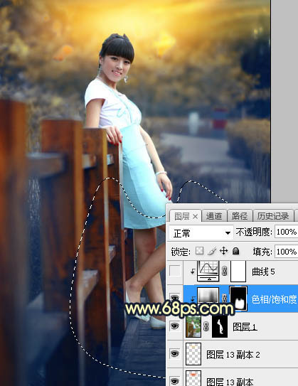 Photoshop调制出秋季晨曦木桥上的人物图片