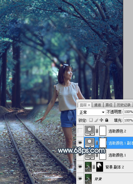 Photoshop调制出柔美的暗调青蓝色轨道边的人物