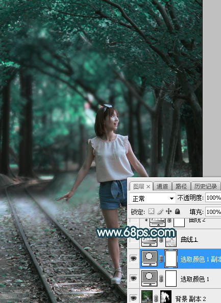Photoshop为树林人物图片打造梦幻的暗青色逆光效果